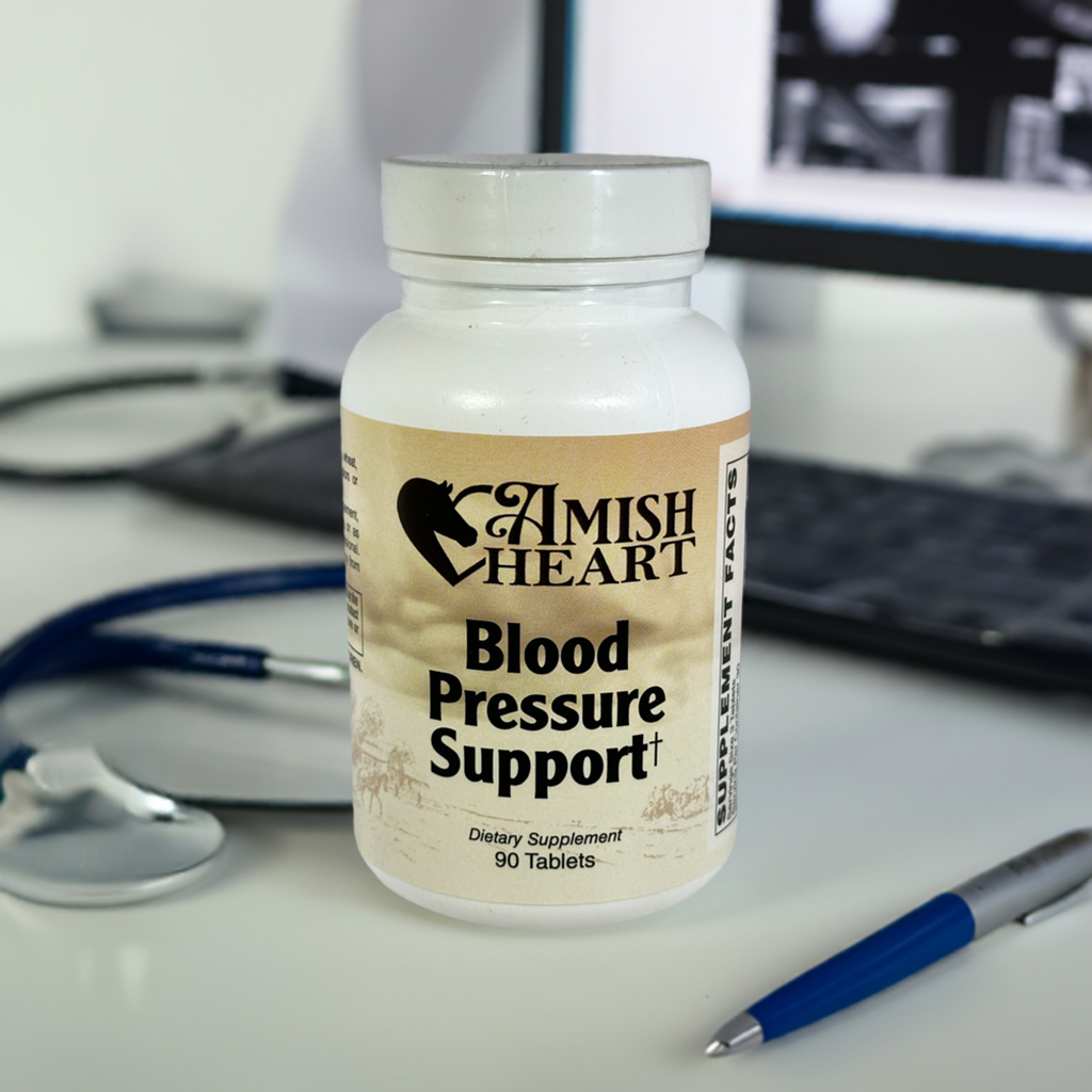 Bottle of Amish Heart Blood Pressure Support† tablets, featuring a blend of hawthorn, magnesium, taurine, and Forslean® for heart health and wellness.