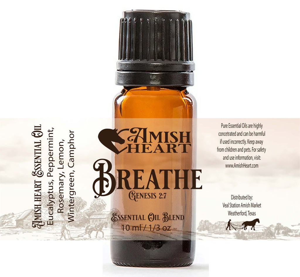 Bottle of Amish Heart Breathe Essential Oil Blend, featuring a blend of eucalyptus, peppermint, and other essential oils for respiratory support and clearer breathing.