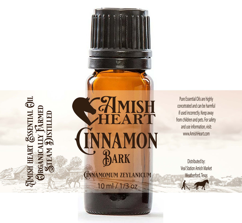 Cinnamon Bark Essential Oil by Amish Heart, featuring warm, spicy aroma, and organic, steam-distilled from Madagascar.