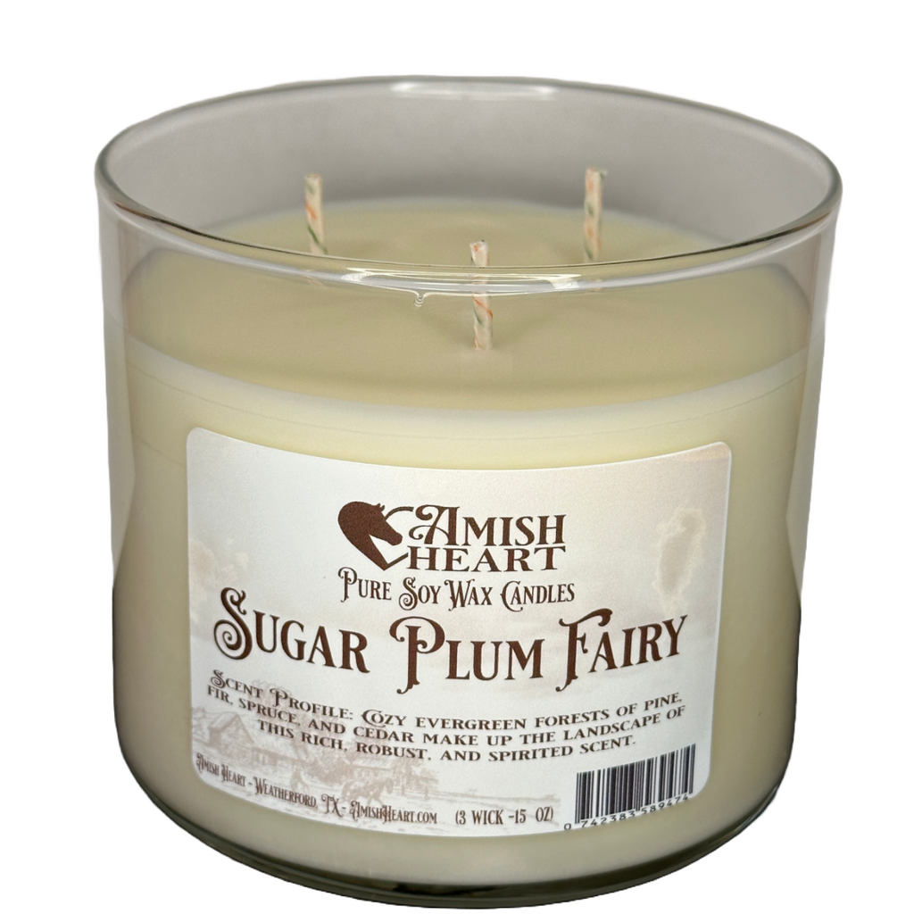 Sugar Plum Fairy Soy Candle by Amish Heart, featuring a rich and robust blend of pine, fir, spruce, and cedar, made from natural soy wax.